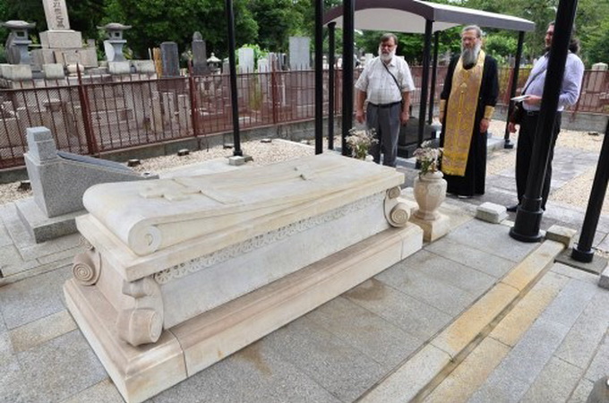 Pilgrims from Ukraine headed by the bishop of the Ukrainian Orthodox Church pray for peace in Ukraine at the tomb of St. Nicholas of Japan