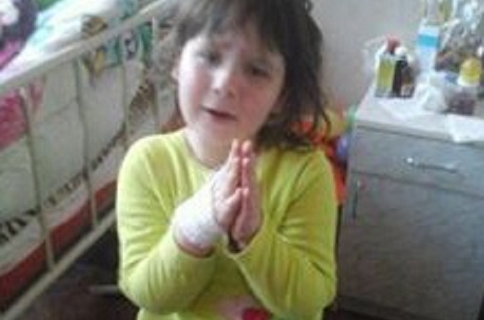 Five-year-old Valentina Miron, who has undergone 70 surgeries, is taken to Germany for treatment by UOC priest